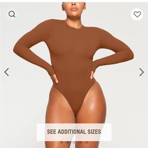 SKIMS Bronze (M) Fits Everybody long sleeve crewneck bodysuit. Gently worn.